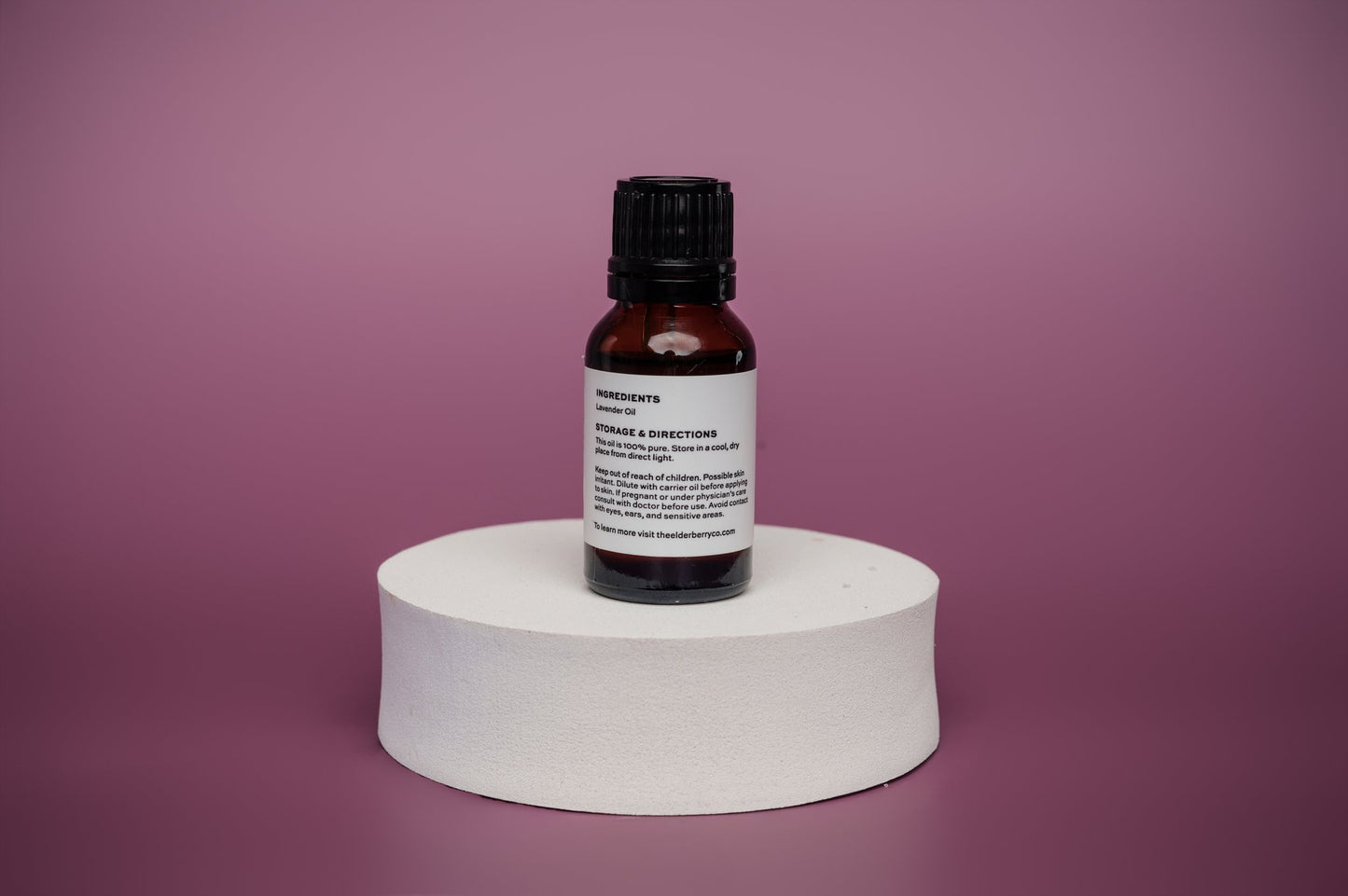 Back view of Elderberry Co. Lavender Essential Oil bottle displaying ingredients and storage instructions for pure lavender essential oil.