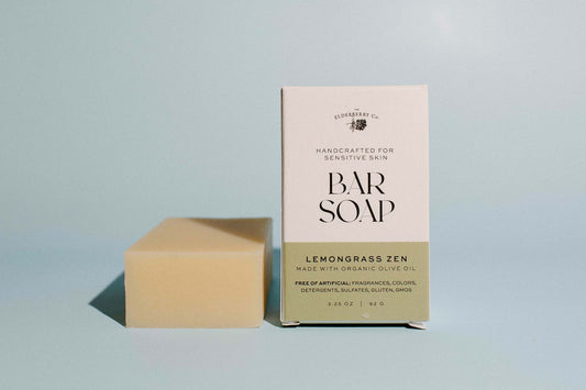 Bar of soap and its packaging with 'Lemongrass Zen' label on a light gray background
