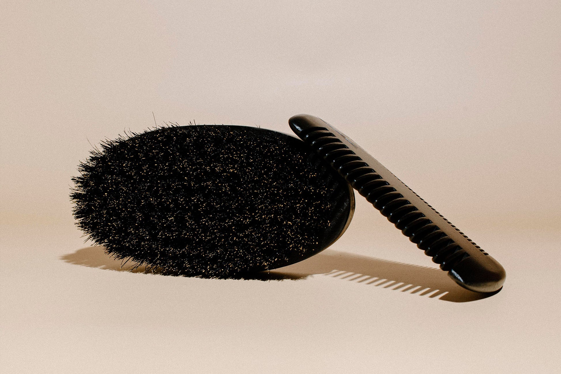 Natural bristle beard brush and black beard comb for daily grooming, styling, detangling, and maintaining a soft, healthy beard.