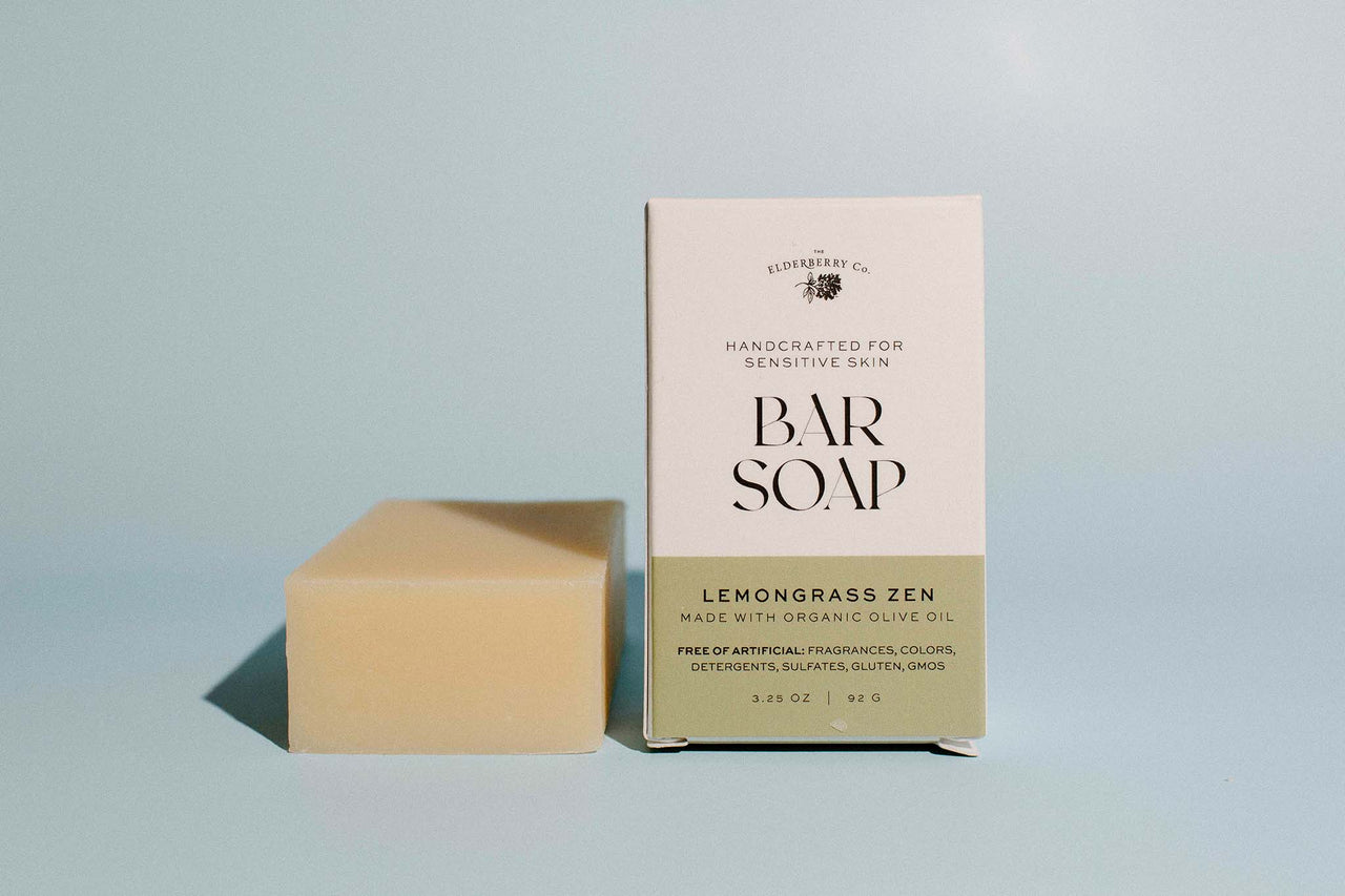 Bar of soap and its packaging with 'Lemongrass Zen' label on a light gray background