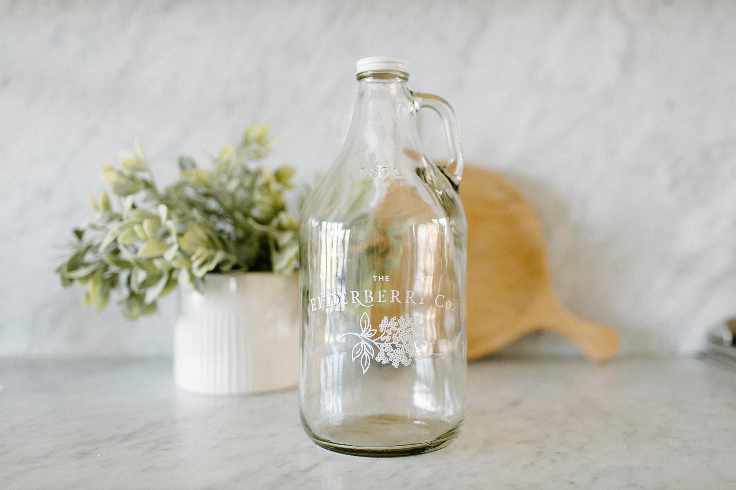 The Elderberry Co. Glass Growler